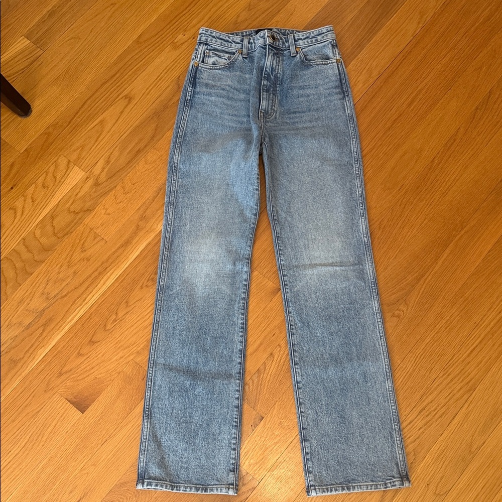 KHAITE Blue Denim Jeans with Gold Accents